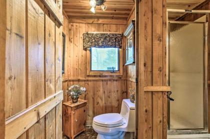 Cozy Cabin with Boats Fire Pit and Deck On Little Lake