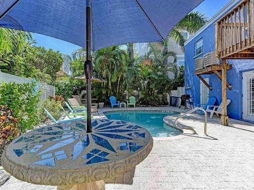 Ideal beach hideaway pool condo located between the island marina and beach - image 19