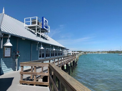 Ideal beach hideaway pool condo located between the island marina and beach - image 29