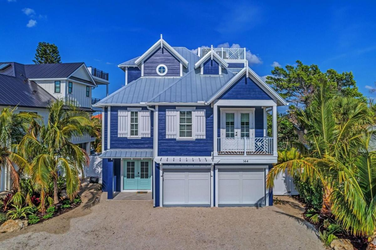 4 bed 4 and a half bath SLEEPS 10 elevator Heated Pool Spa Free WiFi boat dock - main image