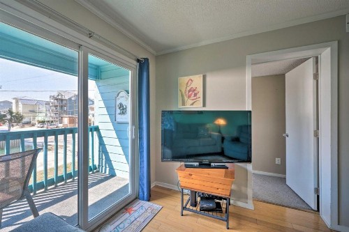Condo with Balcony and Pool Walk to 2 Beach Accesses! - image 6