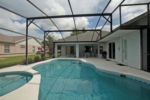Greater Groves-4 Bedrooms home w/pool-5204GG - image 1