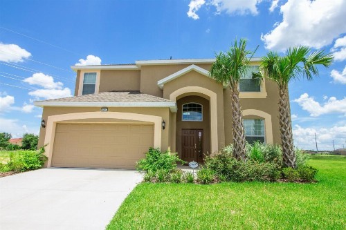 Palm Golf- 6 Bedroom Home with a south facing pool relaxing spa and game room in a gated resort