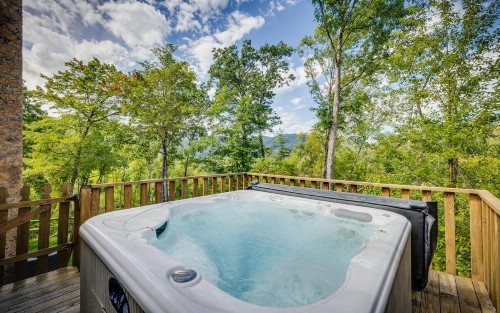 Hand Hewn Hideaway Stunning Gatlinburg Cabin with Hot Tub Table Games and Outdoor Oasis - image 2
