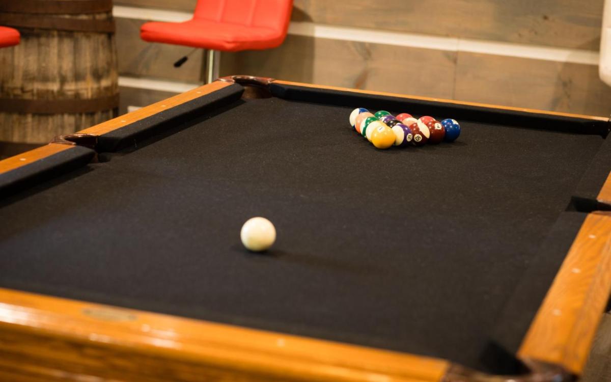 Hand Hewn Hideaway Stunning Gatlinburg Cabin with Hot Tub Table Games and Outdoor Oasis - image 7