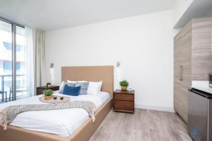 Special Offer Beachfront Condo ROOFTOP POOL - image 7