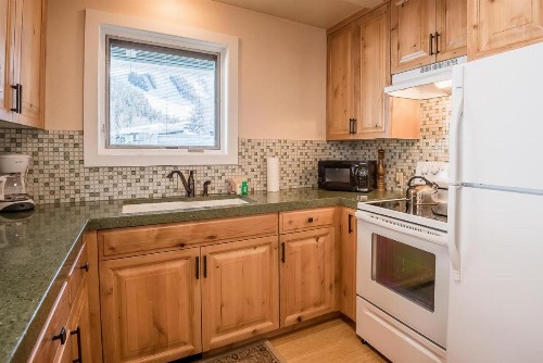 Prospector Condominiums walk to lift - image 16