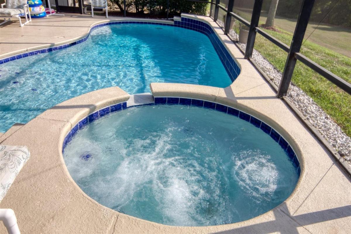 SP8143 - Fabulous 6 Bedroom Pool Home with conservation view at Windsor Palms close to Disney World - main image