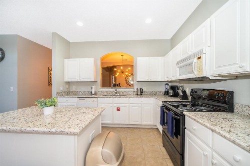 Emerald Island Escape- 8 Bedroom vacation home with a private pool & spa and located in a gated resort - image 7