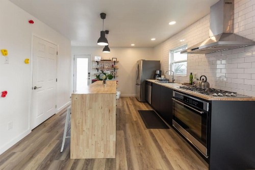 Modern minimalist comfort 5 minutes from downtown - image 7
