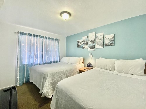 Bluebird Day Inn & Suites - image 19