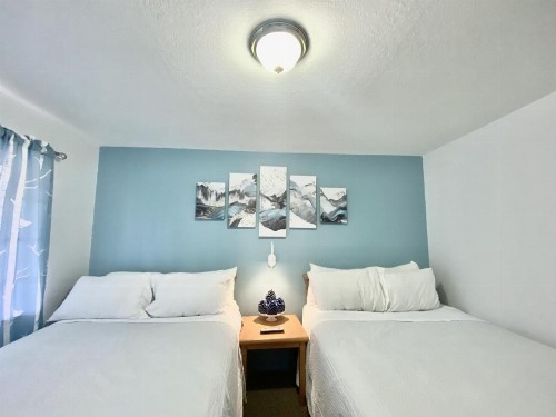 Bluebird Day Inn & Suites - image 2