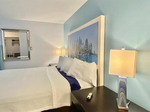 Bluebird Day Inn & Suites - image 24