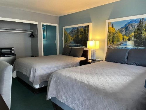 Bluebird Day Inn & Suites - image 31