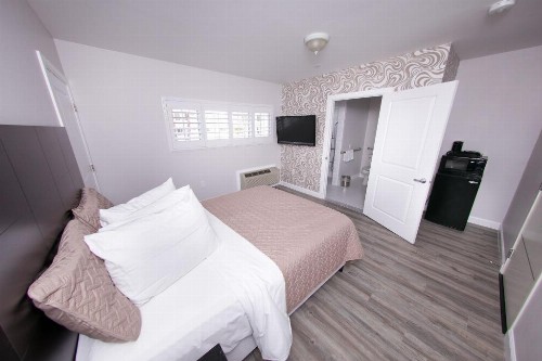 Metropolitan Inn & Suites - image 12