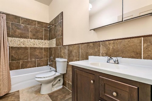 Urban Condos with Spacious Rooms & Amenities - image 10