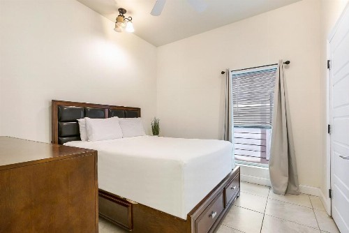 Urban Condos with Spacious Rooms & Amenities - image 11