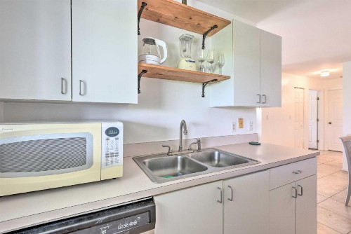 NSB Condo with Pool and Grill Deck - Walk to Beach - image 11