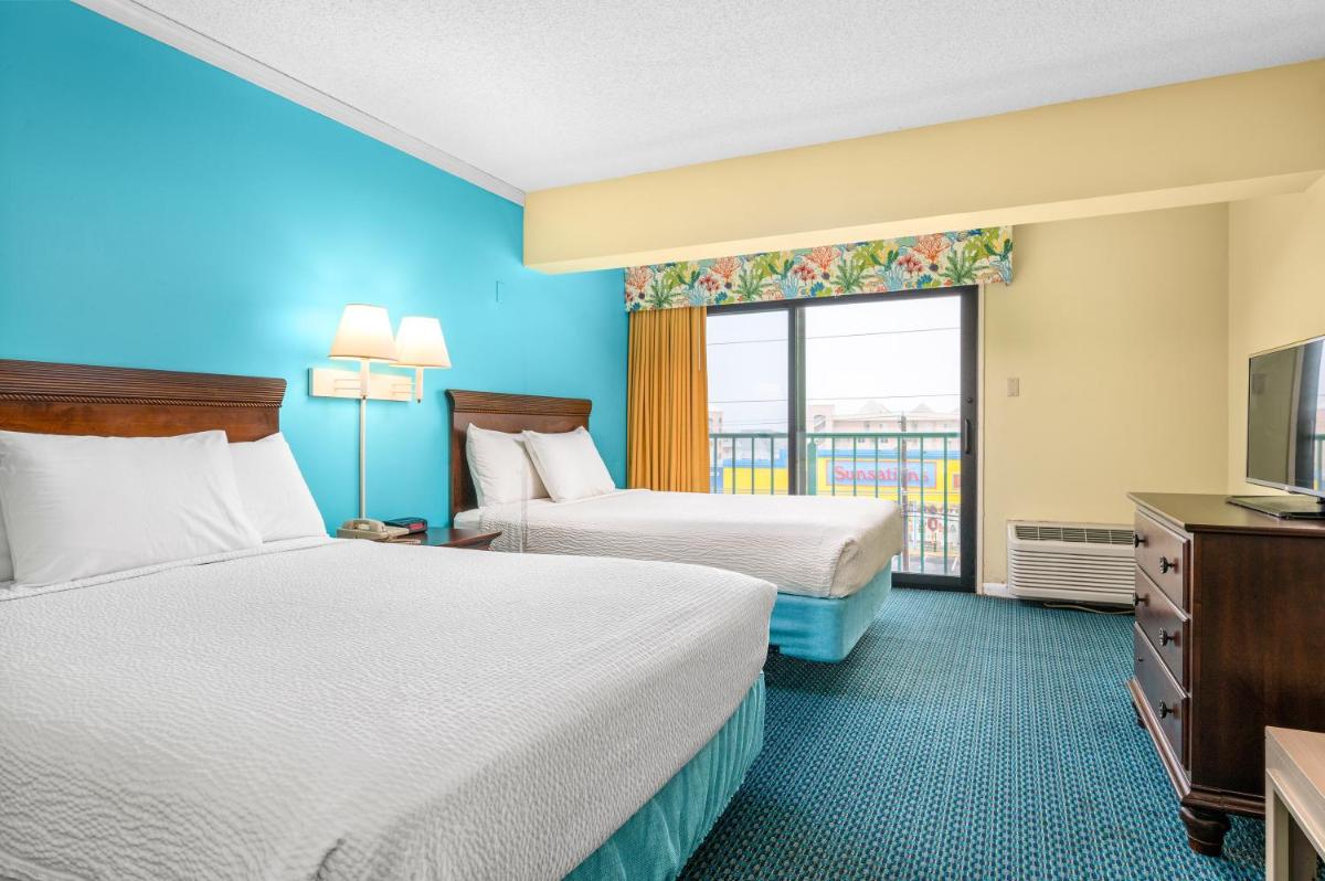 Cayman Suites Hotel - main image