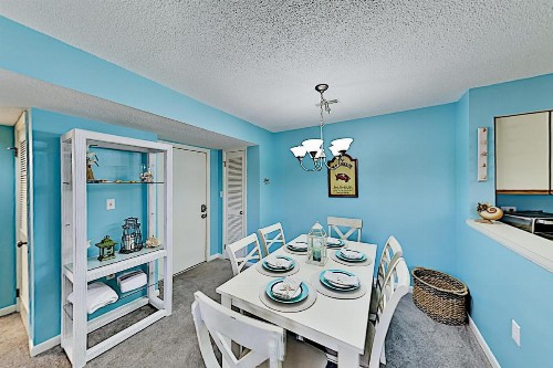 Oceanside Gem with Private Deck Canal Views & Pools condo - image 9