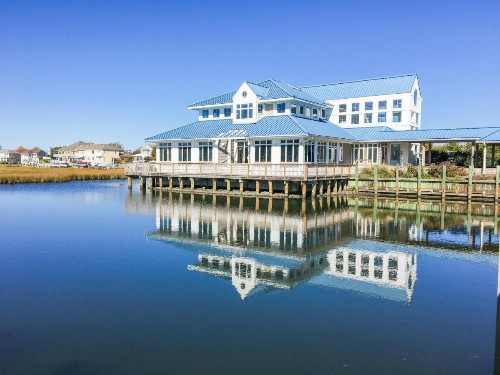 Oceanside Gem with Private Deck Canal Views & Pools condo - image 6
