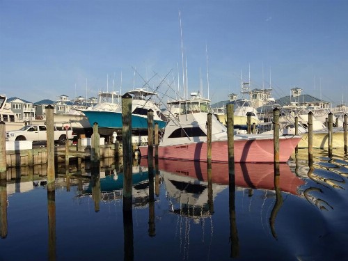 Oceanside Gem with Private Deck Canal Views & Pools condo - image 7