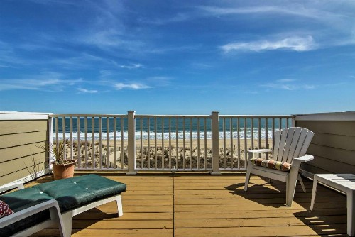 Nautical Beachfront Condo with Deck and Ocean Views! - image 1
