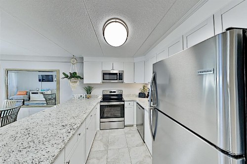 Stylish Beachfront Condo with Pool - Steps to Sand condo - image 7
