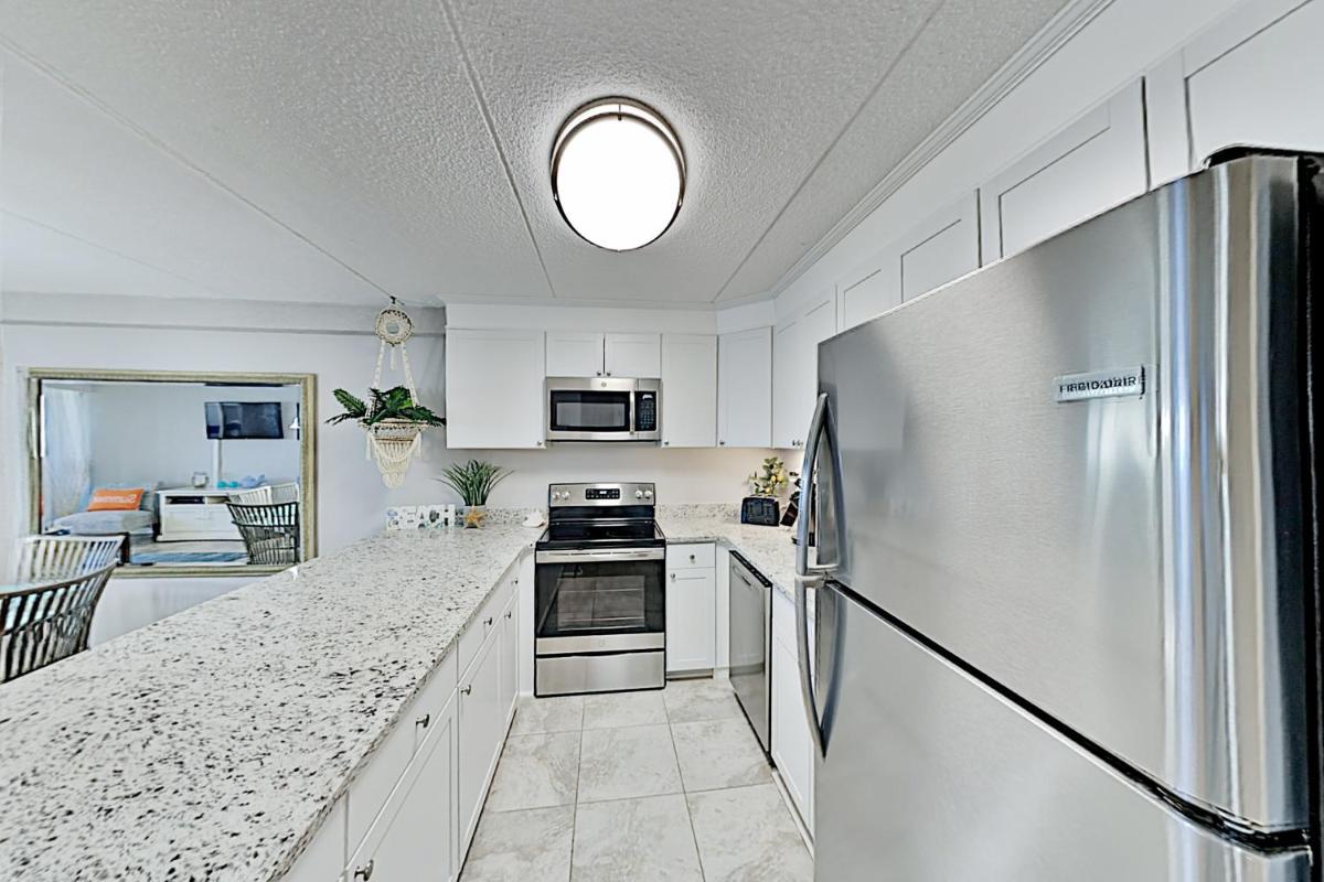 Stylish Beachfront Condo with Pool - Steps to Sand condo - image 7