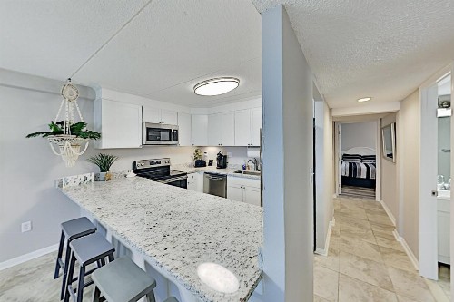 Stylish Beachfront Condo with Pool - Steps to Sand condo - image 9