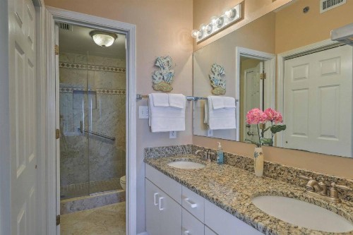 Serene Beachfront Condo with Balcony and Ocean Views! - image 10