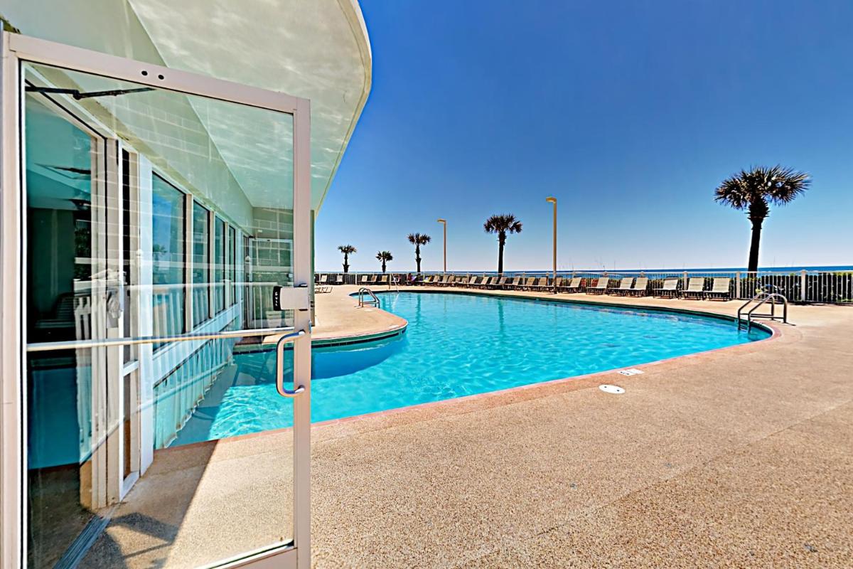 Beach-View Tradewinds Retreat Beachside Pool condo - image 3
