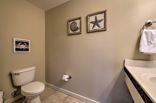 Coastal Condo with Ocean Views and Pool Access! - image 11