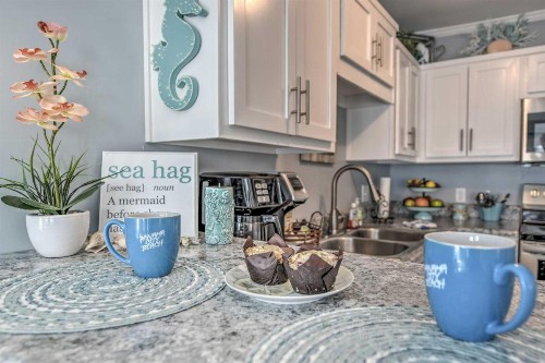 Recently Renovated PCB Condo Steps to Beach! - image 11