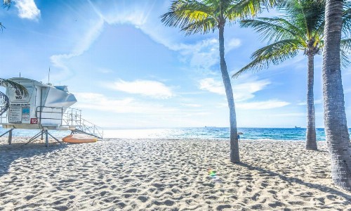 Coco Palm Escape: 5 Min Walk to Beaches 5 Star Home 4/2 Feet to BEACH Heated Pool!