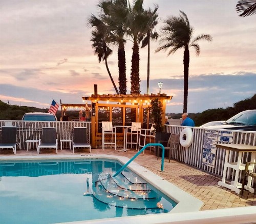 Ocean Sands Beach Inn Ultra Sparkling Saltwater Mineral Pool open until 4 AM Board Games in Lobby Bedside Candy in all rooms Summer Special - image 3