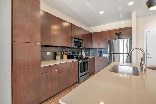 Curated Comfort with Riverwalk Access and Resort Style Pool - image 10