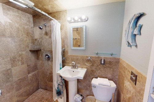 #223 Surf Song Resort - image 27