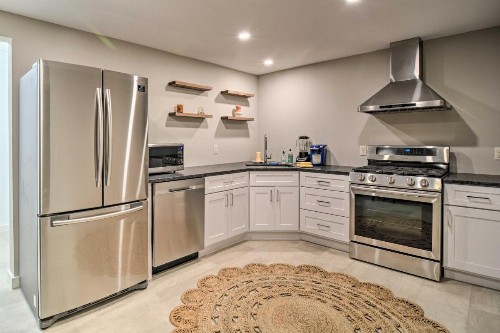 Up North Getaway with Hot Tub and Direct Lake Access! - image 9