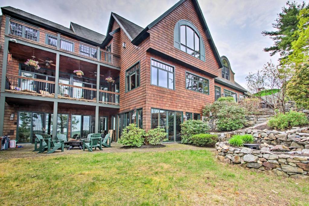 Lakefront Alton Bay Home with Movie Theater and Dock - main image