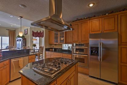 Lavish Waterfront Home with Pool and Shared Dock! - image 12
