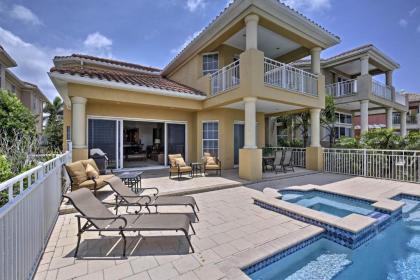 Lavish Waterfront Home with Pool and Shared Dock! - image 13