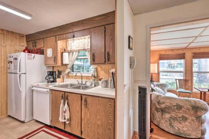 Canal-front Home with Boathouse and Fishing Deck! - image 10