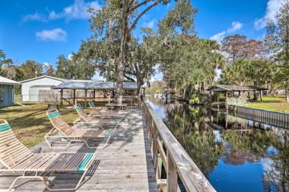 Canal-front Home with Boathouse and Fishing Deck! - image 3