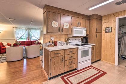 Canal-front Home with Boathouse and Fishing Deck! - image 9