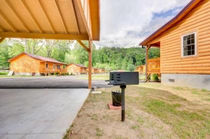 Charming Riverfront Cabin with Private Deck and Hot Tub - image 3