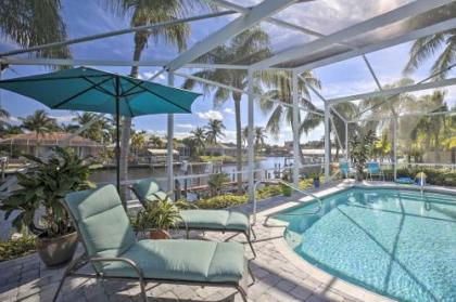 Coral Sunrise Waterfront Retreat with Pool and Patio