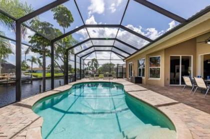 Villa Barefoot   Roelens Vacations   Heated Pool  Spa Gulf Access Sleeping Capabilities for 10 Cape Coral Florida