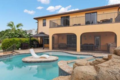 Stunning Waterfront Villa in Cape Coral with Lagoon Style Pool Spa and Boat Lift Cape Coral