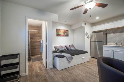 34B- Modern studio condo heated pool and dog park - image 9